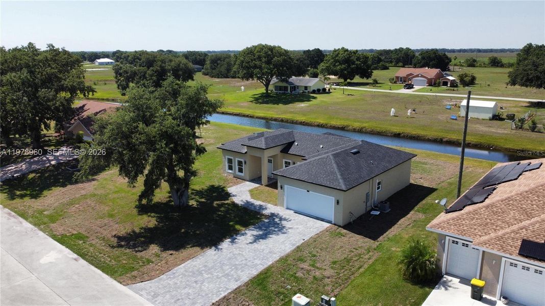 Front exterior of a new home in , Sebring, FL, highlighting curb appeal (Image 19).