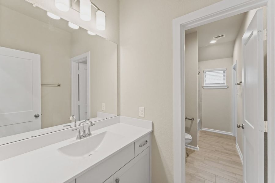 Furnished interior view inside a new home in The Woodlands Hills, Willis (Image 6).