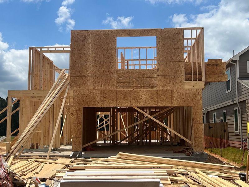 In-progress construction of a new home in Mackenzie Creek, Conroe, TX (Image 29).
