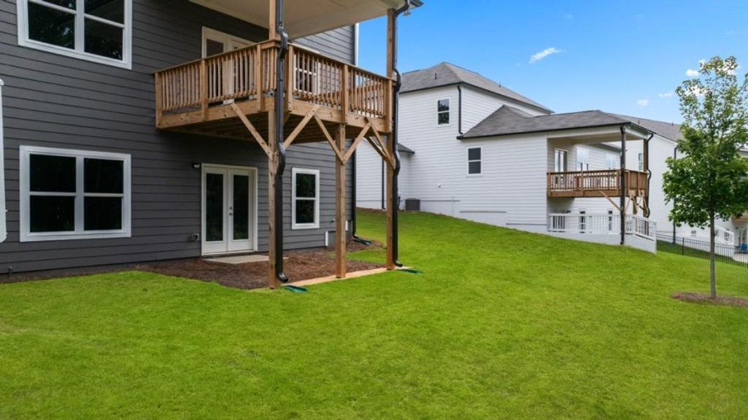 Exterior details and patio area of a home in Falcon Landing, Gainesville (Image 4).