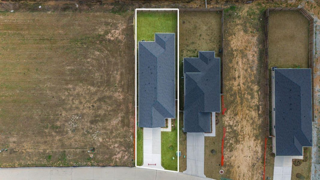 This home sits on a large lot with ample yard space in front and the back, lush landscaping and well-maintained yard!