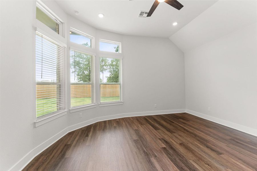 Bonus room with a ceiling fan, healthy amount of natural light, dark wood-type flooring, baseboards, and recessed lighting Bonus room with a ceiling fan, healthy amount of natural light, dark wood-type flooring, baseboards, and recessed lighting