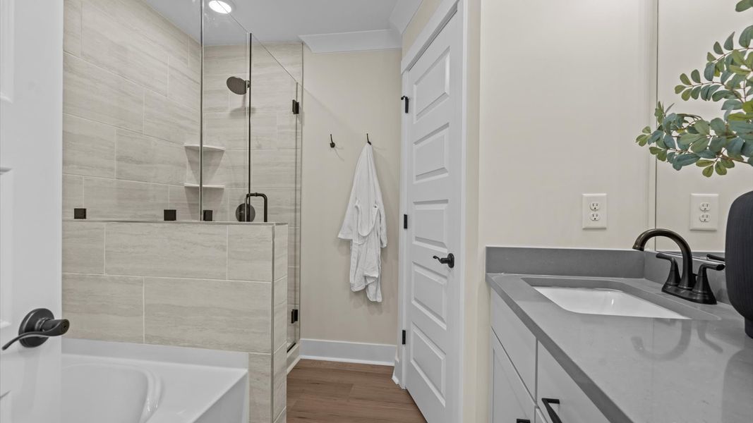 Representative furnished interior of a home built from the Litchfield by DRB Homes in North First Street Townes, Mebane (Image 26).