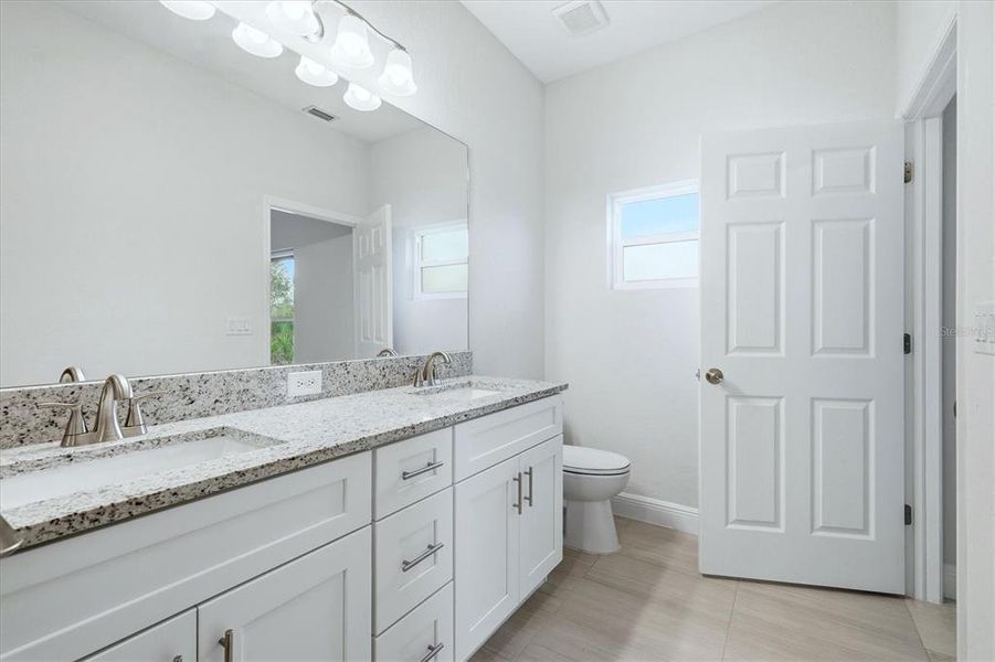 Furnished interior view inside a new home in , North Port (Image 30).