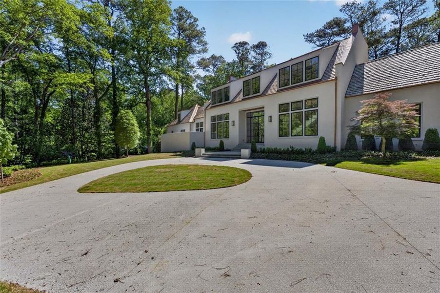 Front exterior of a new home in , Atlanta, GA, highlighting curb appeal (Image 26). Front exterior of a new home in , Atlanta, GA, highlighting curb appeal (Image 26).