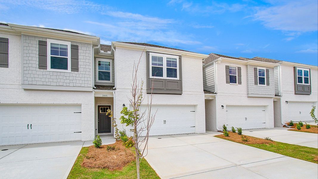 Representative exterior photo of a completed home built from the Austin - Alternate by DRB Homes in Bowers Farm Townhomes, McDonough, GA (Image 23).