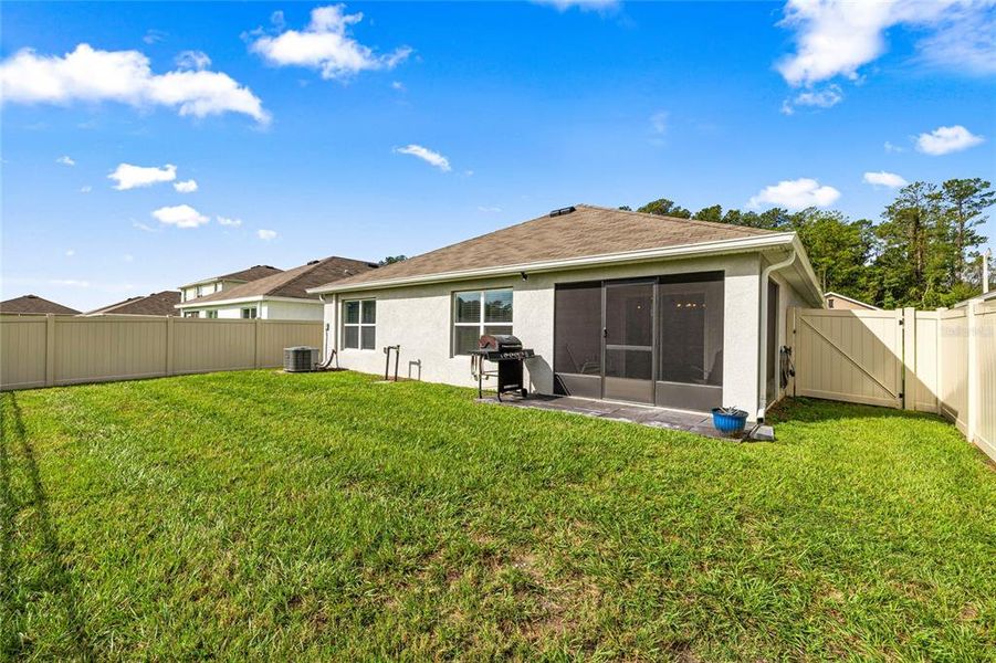 Exterior details and patio area of a home in Deer Path, Ocala (Image 20).