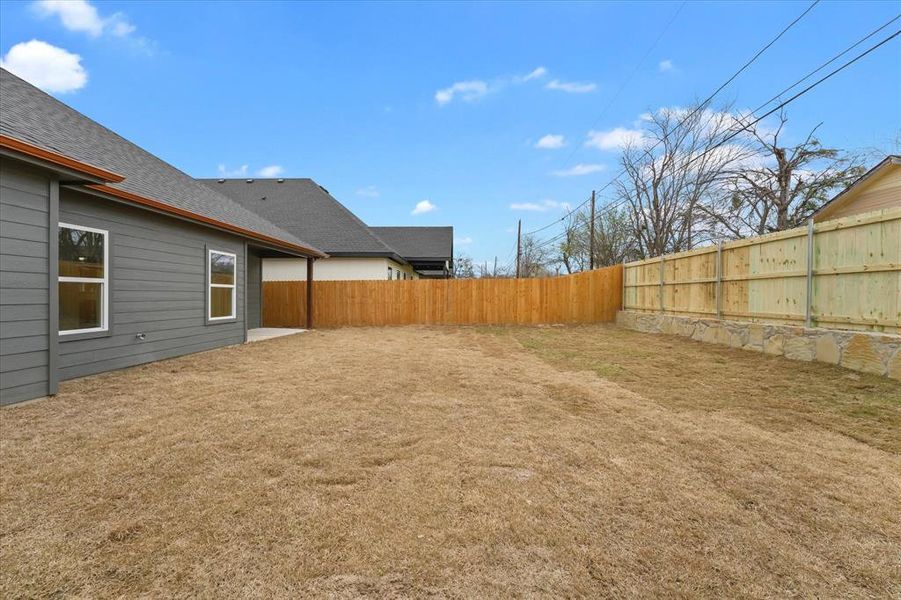 Exterior details and patio area of a home in , Fort Worth (Image 17).