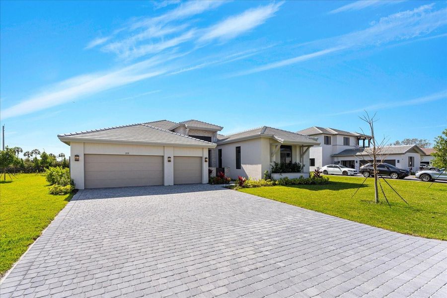 Large driveway and 3 car garage