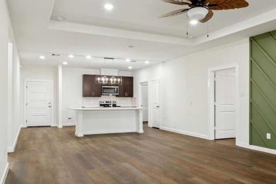 Discover the perfect blend of style and comfort in this open-concept kitchen, dining, and living area—ideal for entertaining and relaxation. Discover the perfect blend of style and comfort in this open-concept kitchen, dining, and living area—ideal for entertaining and relaxation.