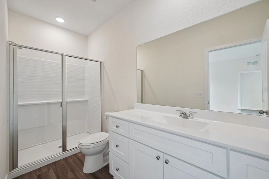 Representative furnished interior of a home built from the Odyssey by Starlight Homes in Oakfield Lakes, Parrish (Image 11).