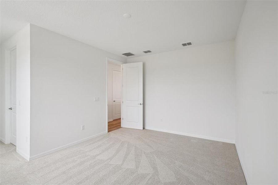 Spacious, unfurnished interior of a new home in Primrose at Longleaf, New Port Richey (Image 26).