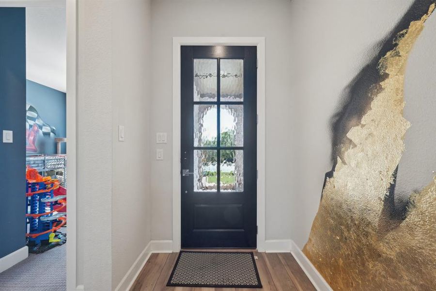 Entryway featuring hardwood / wood-style floors