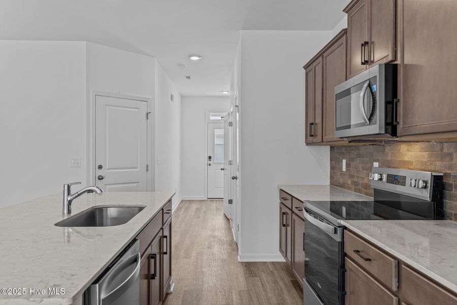 Furnished interior view inside a new home in Coastal Haven Townes, Leland (Image 10).