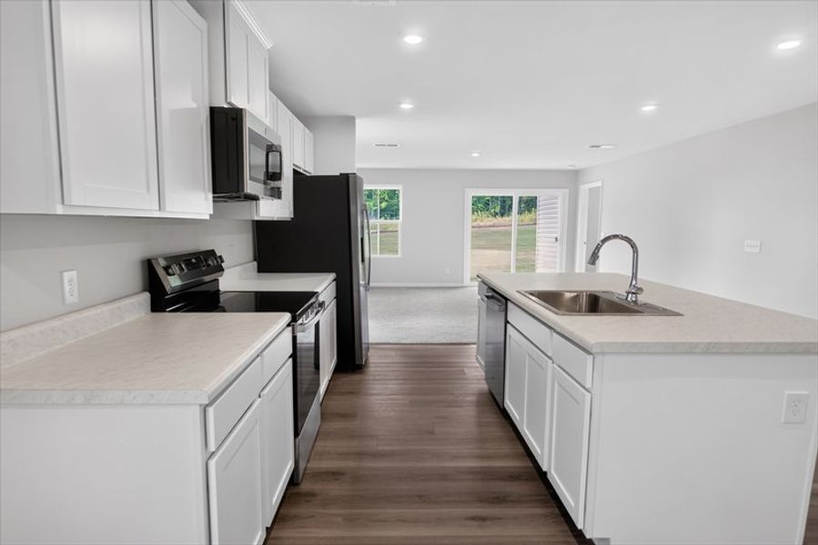 Furnished interior view inside a new home in Wren Woods 2-Story, Gray Court (Image 5).