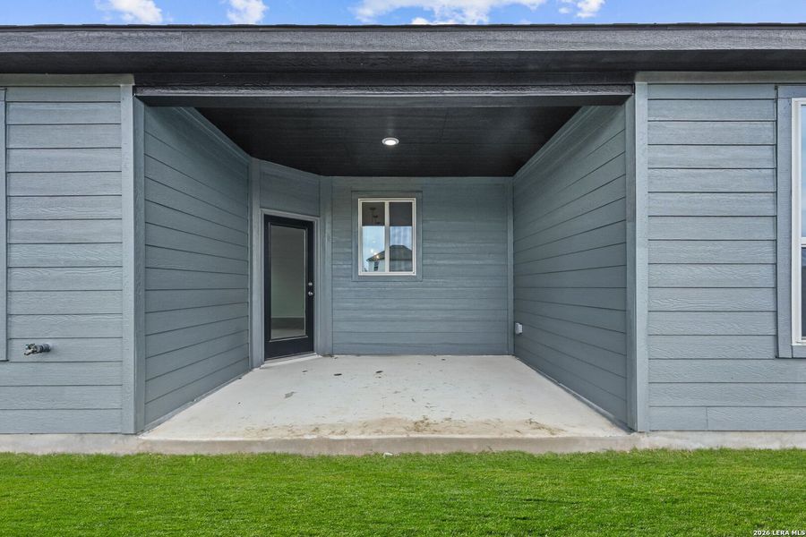 Exterior details and patio area of a home in Dove Song, Marion (Image 15).