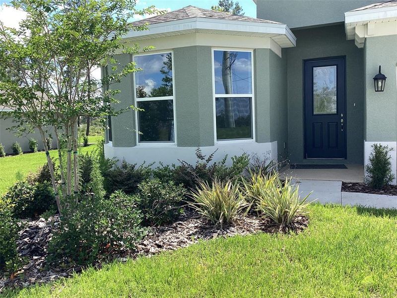 Front exterior of a new home in , Ocala, FL, highlighting curb appeal (Image 26).