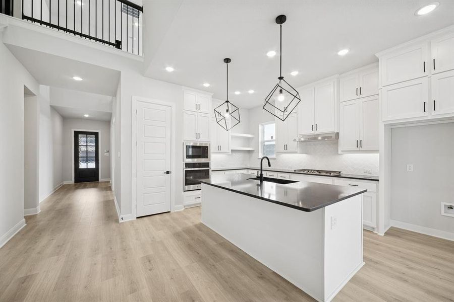 Furnished interior view inside a new home in Pecan Square - Gardens, Northlake (Image 12). Furnished interior view inside a new home in Pecan Square - Gardens, Northlake (Image 12).
