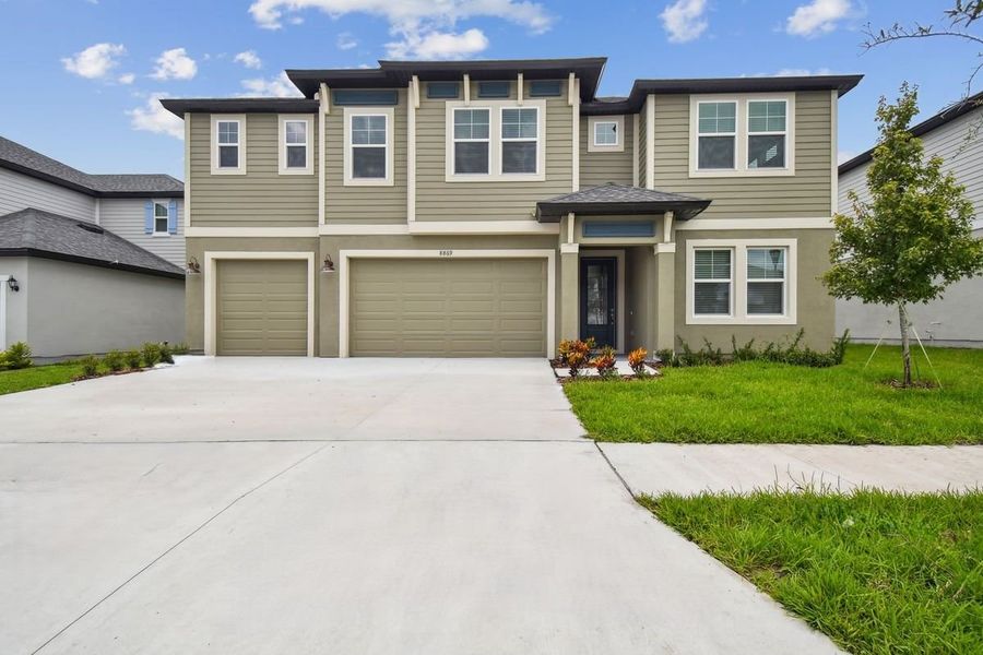 Representative exterior photo of a completed home built from the Sebastian by William Ryan Homes in The Sanctuary – Royal Collection, Punta Gorda, FL (Image 29).