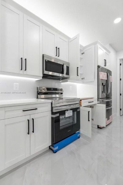 Furnished interior view inside a new home in , Lehigh Acres (Image 16).