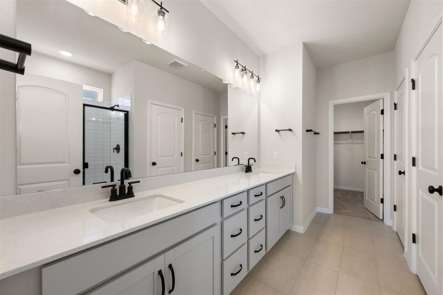 Furnished interior view inside a new home in The Colony 50s, Bastrop (Image 6). Furnished interior view inside a new home in The Colony 50s, Bastrop (Image 6).