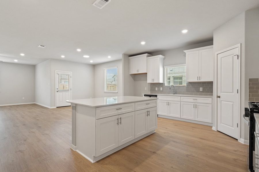 Furnished interior view inside a new home in Crosswinds, Kyle (Image 4).