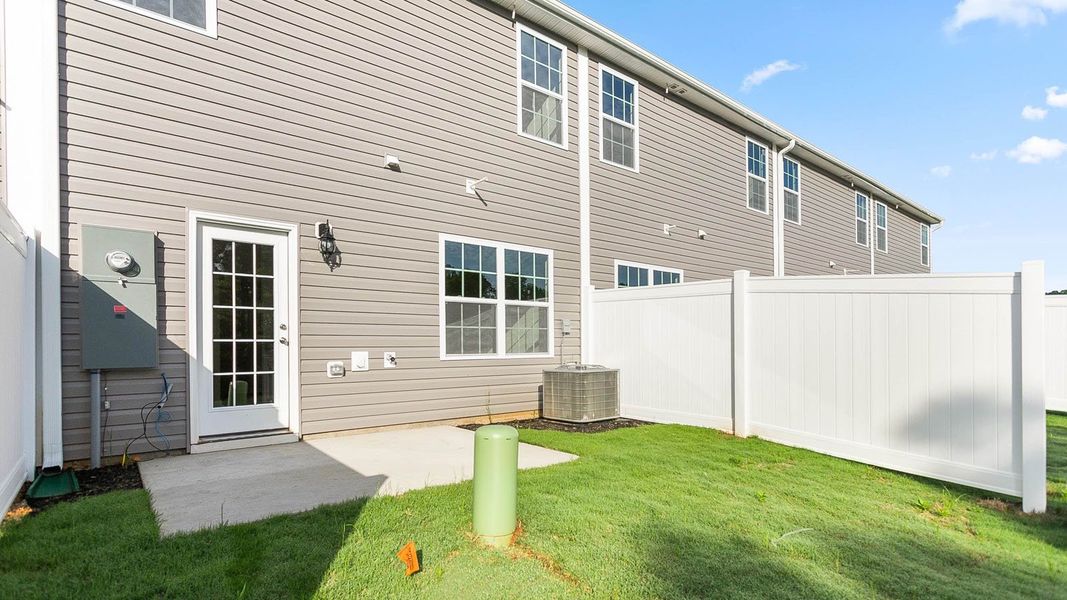Exterior details and patio area of a home in Henley Ridge, Graham (Image 2). Exterior details and patio area of a home in Henley Ridge, Graham (Image 2).