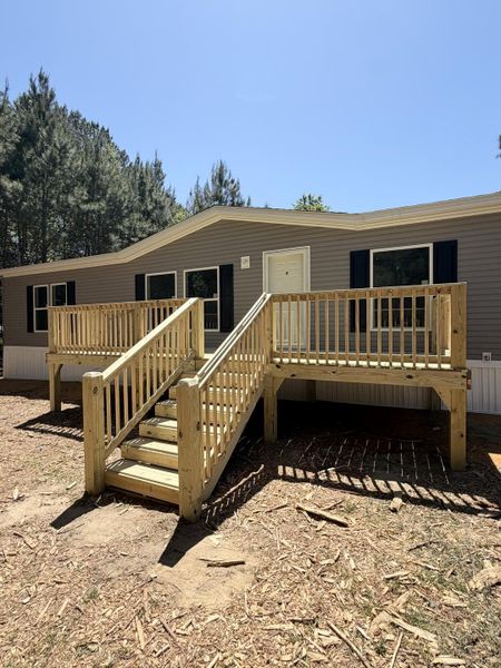 Exterior details and patio area of a home in , Round O (Image 9).