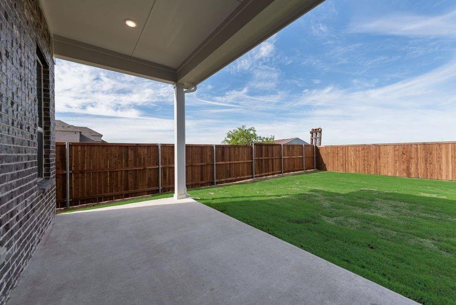 Exterior details and patio area of a home in Villages of Creekwood, Frisco (Image 4). Exterior details and patio area of a home in Villages of Creekwood, Frisco (Image 4).