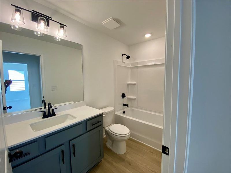 Furnished interior view inside a new home in Eastlyn Crossing, Flowery Branch (Image 12).