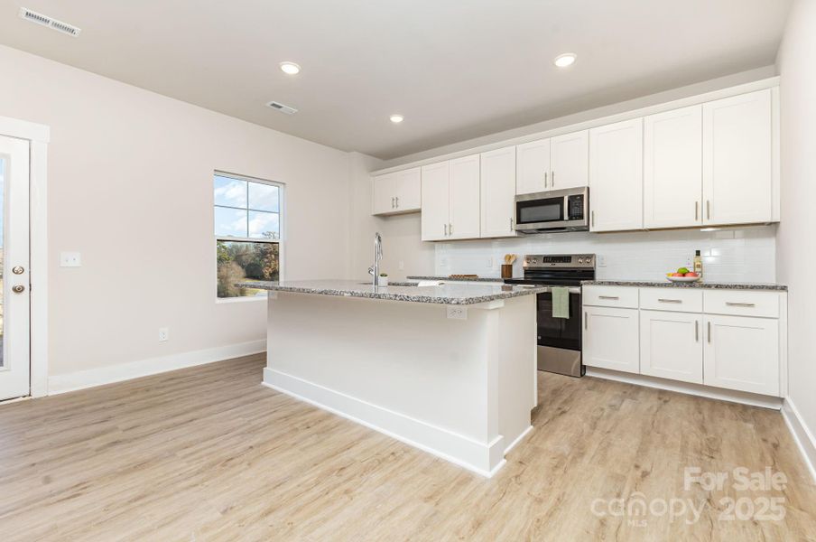 Furnished interior view inside a new home in , Mooresville (Image 5).
