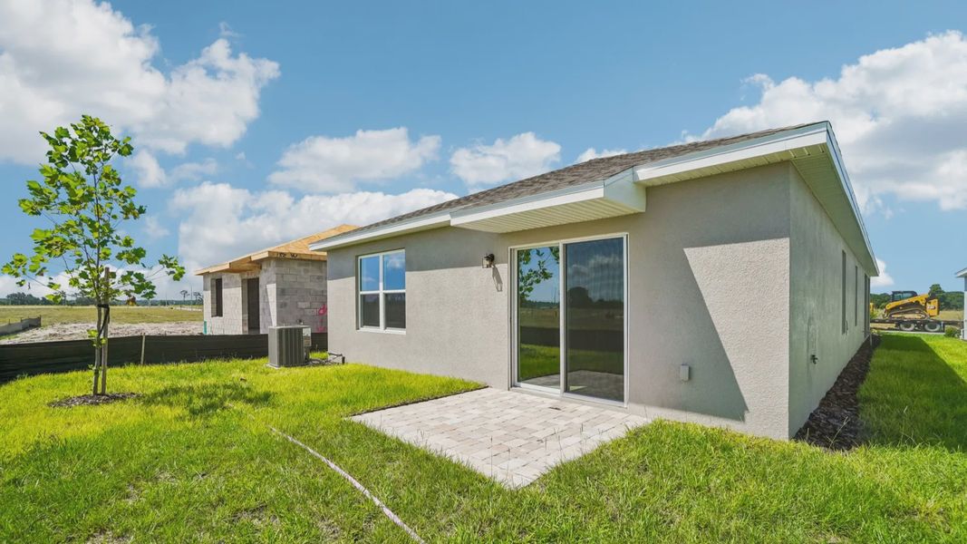 Exterior details and patio area of a home in Willowbrook North, Winter Haven (Image 4).