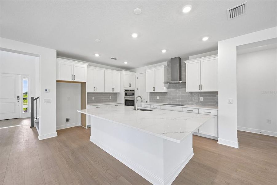 Furnished interior view inside a new home in Creeks Edge at Twin Rivers, Parrish (Image 13).