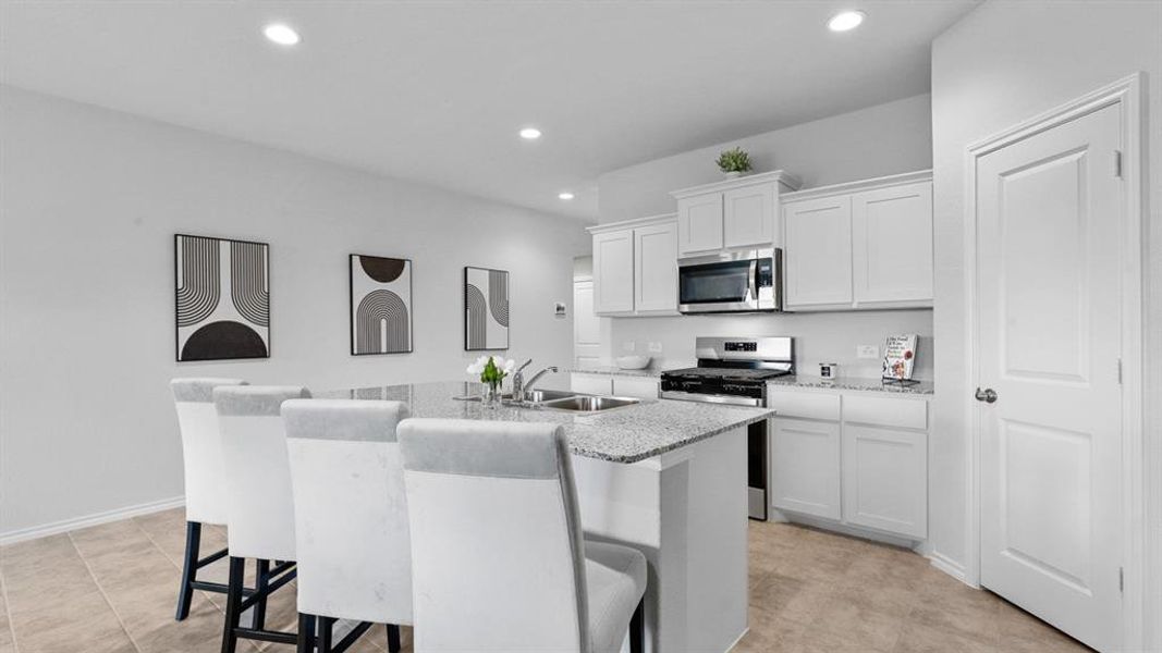 Kitchen - All Home and community information, including pricing, included features, terms, availability and amenities, are subject to change at any time without notice or obligation. All Drawings, pictures, photographs, video, square footages, floor plans, elevations, features, colors and sizes are approximate for illustration purposes only and will vary from the homes as built.
