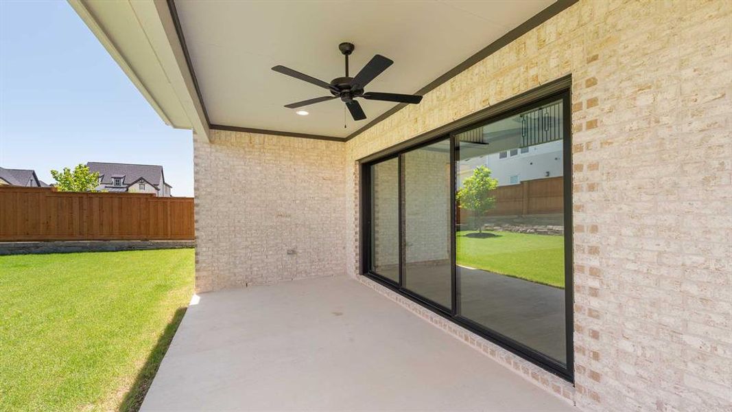 View of patio featuring a ceiling fan