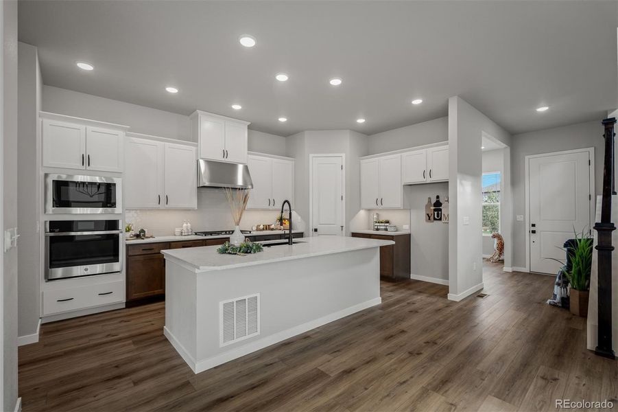 Furnished interior view inside a new home in Revel Crossing at Wolf Ranch – The Outlook Collection, Colorado Springs (Image 9).
