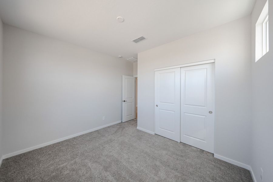 A room with white doors.