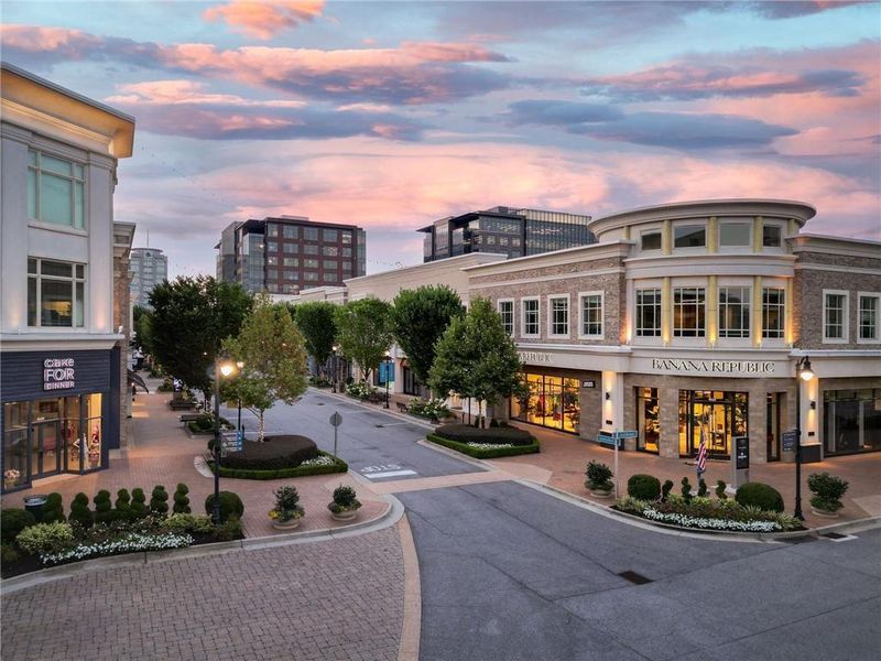 Front exterior of a new home in Echo at Crabapple, Milton, GA, highlighting curb appeal (Image 2). Front exterior of a new home in Echo at Crabapple, Milton, GA, highlighting curb appeal (Image 2).