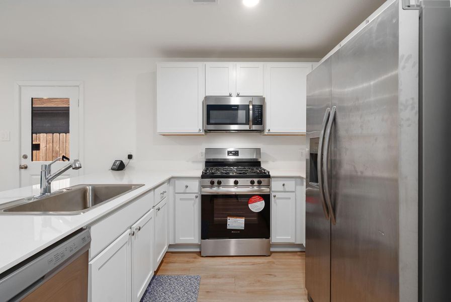 Furnished interior view inside a new home in Ladera Trails, Conroe (Image 8).