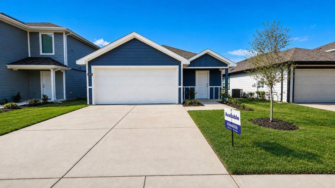 Front exterior of a new home in Hickory Grove, Krum, TX, highlighting curb appeal (Image 1). Front exterior of a new home in Hickory Grove, Krum, TX, highlighting curb appeal (Image 1).