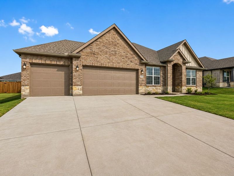 Front exterior of a new home in Waverly Estates, Josephine, TX, highlighting curb appeal (Image 2). Front exterior of a new home in Waverly Estates, Josephine, TX, highlighting curb appeal (Image 2).