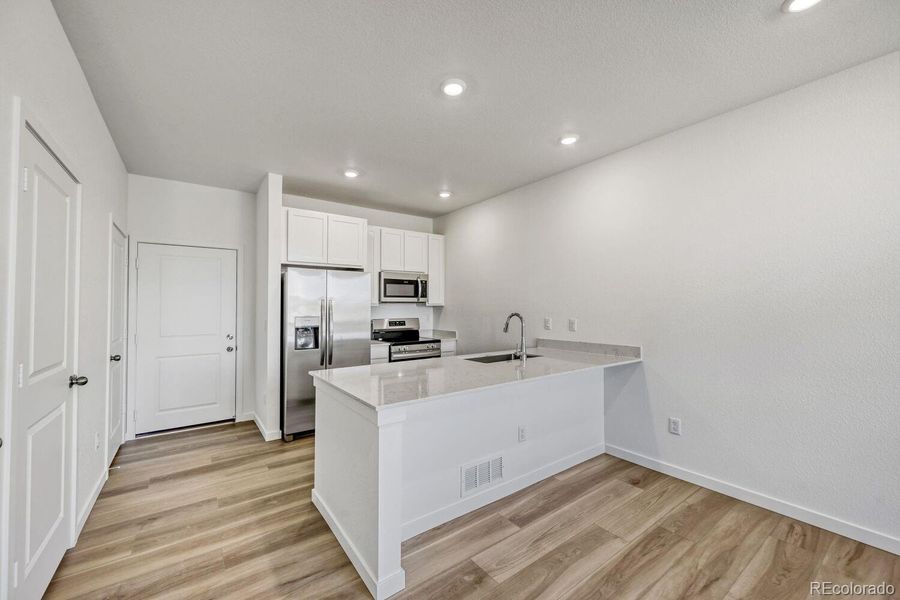 Furnished interior view inside a new home in Parterre, Thornton (Image 6).
