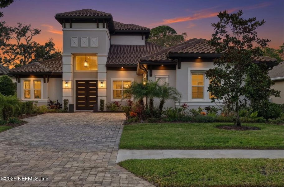 Front exterior of a new home in , Palm Coast, FL, highlighting curb appeal (Image 27).