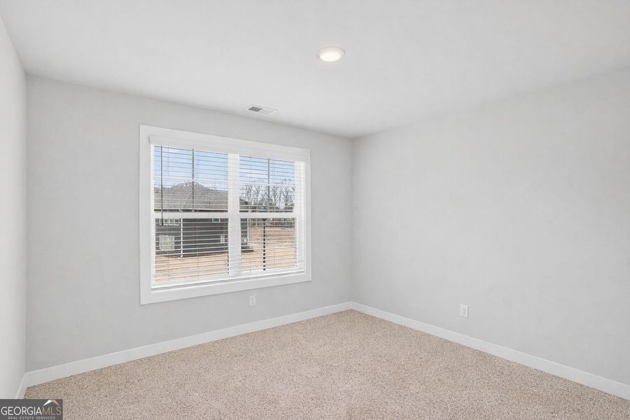 Spacious, unfurnished interior of a new home in The Fairways at Mirror Lake, Villa Rica (Image 47). Spacious, unfurnished interior of a new home in The Fairways at Mirror Lake, Villa Rica (Image 47).