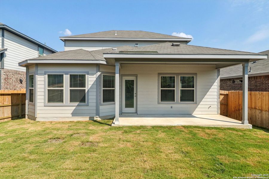 Front exterior of a new home in Comanche Ridge, San Antonio, TX, highlighting curb appeal (Image 20). Front exterior of a new home in Comanche Ridge, San Antonio, TX, highlighting curb appeal (Image 20).