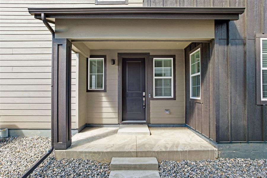 Front exterior of a new home in , Berthoud, CO, highlighting curb appeal (Image 21).