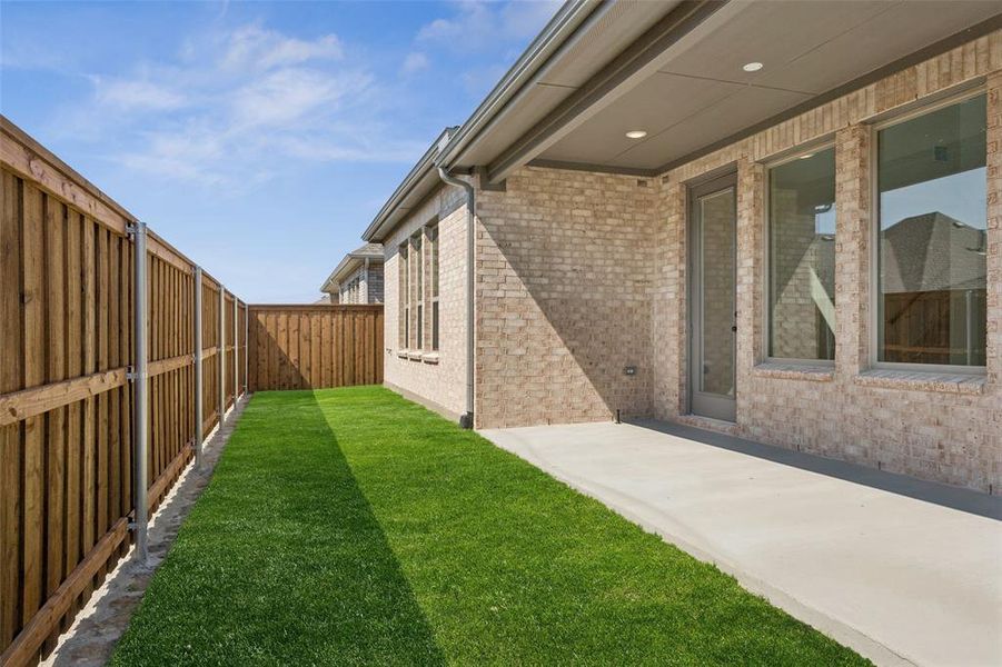 You'll enjoy morning coffee or evening wind downs on this lovely covered patio.