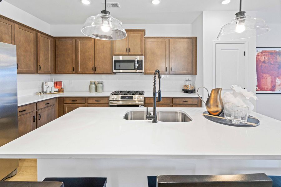 **These photos are examples of a different home with the same floorplan. Interior and exterior may differ.**