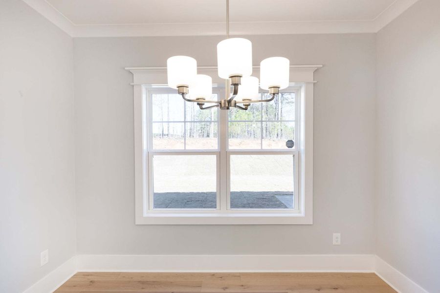 Representative furnished interior of a home built from the Austin by Caviness & Cates Communities in Bartlett Manor, Youngsville (Image 123).