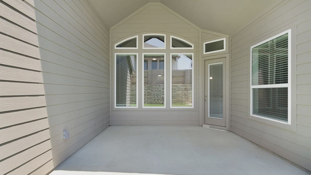 Representative exterior details of a home built from the Brenner by Chesmar Homes in Newhaven, Manor (Image 3).